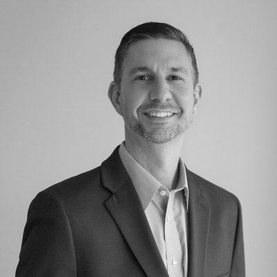 Black and white portrait of Keith Dokho