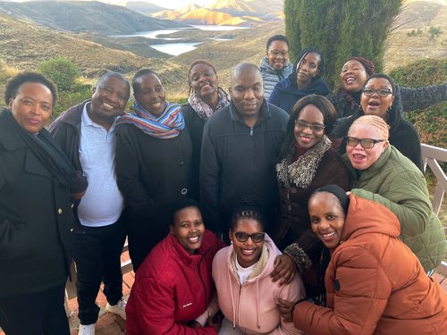 Photo of Lesotho workshop participants with scenery